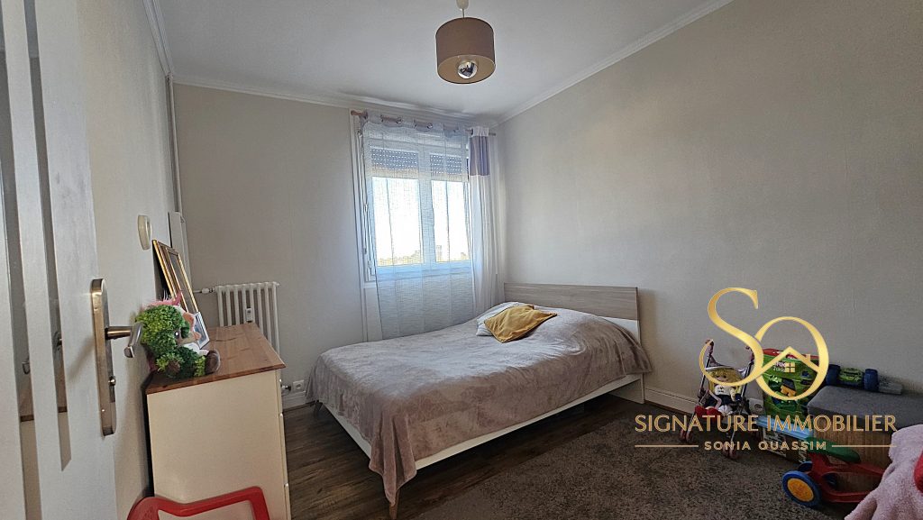 Appartement T3 avec garage et cave à Châlons-en-Champagne (51000) - 85 000 € chambre 2 signature immobilier