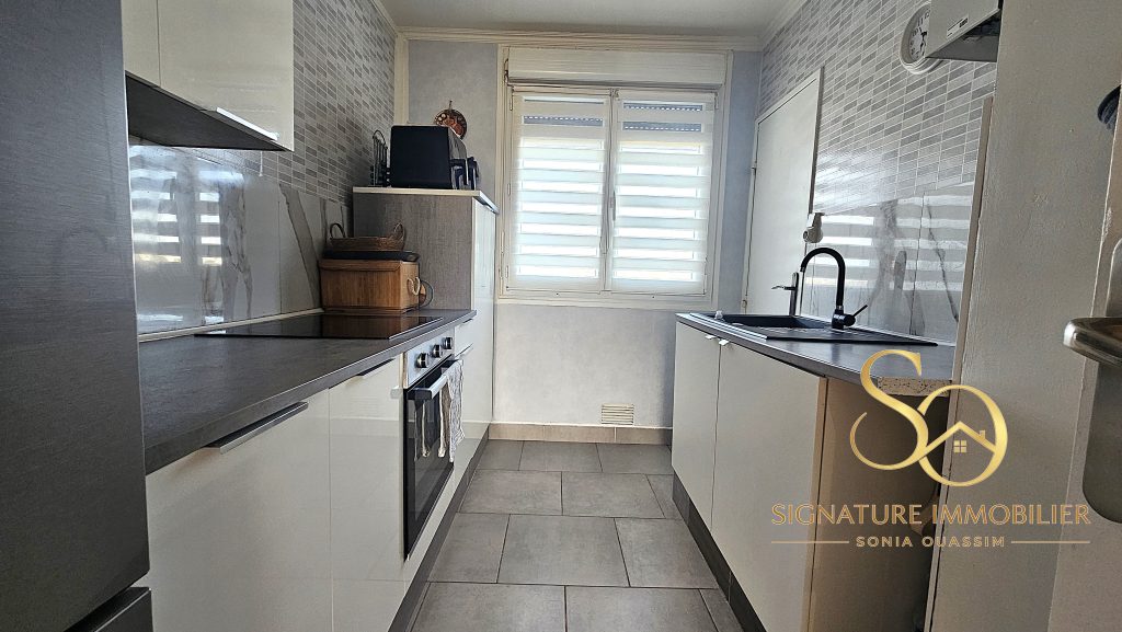 Appartement T3 avec garage et cave à Châlons-en-Champagne (51000) - 85 000 € cuisine signature immobilier